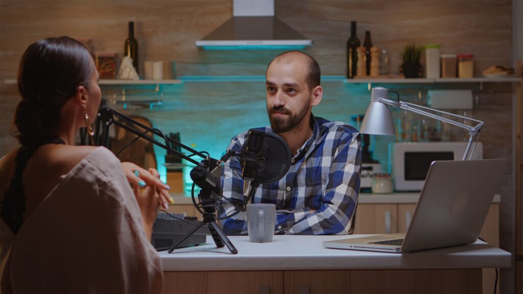Host interviewing a guest for a podcast